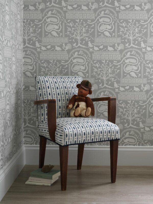 American Fantasy in light gray wallpaper with chair in cutwork stripe navy